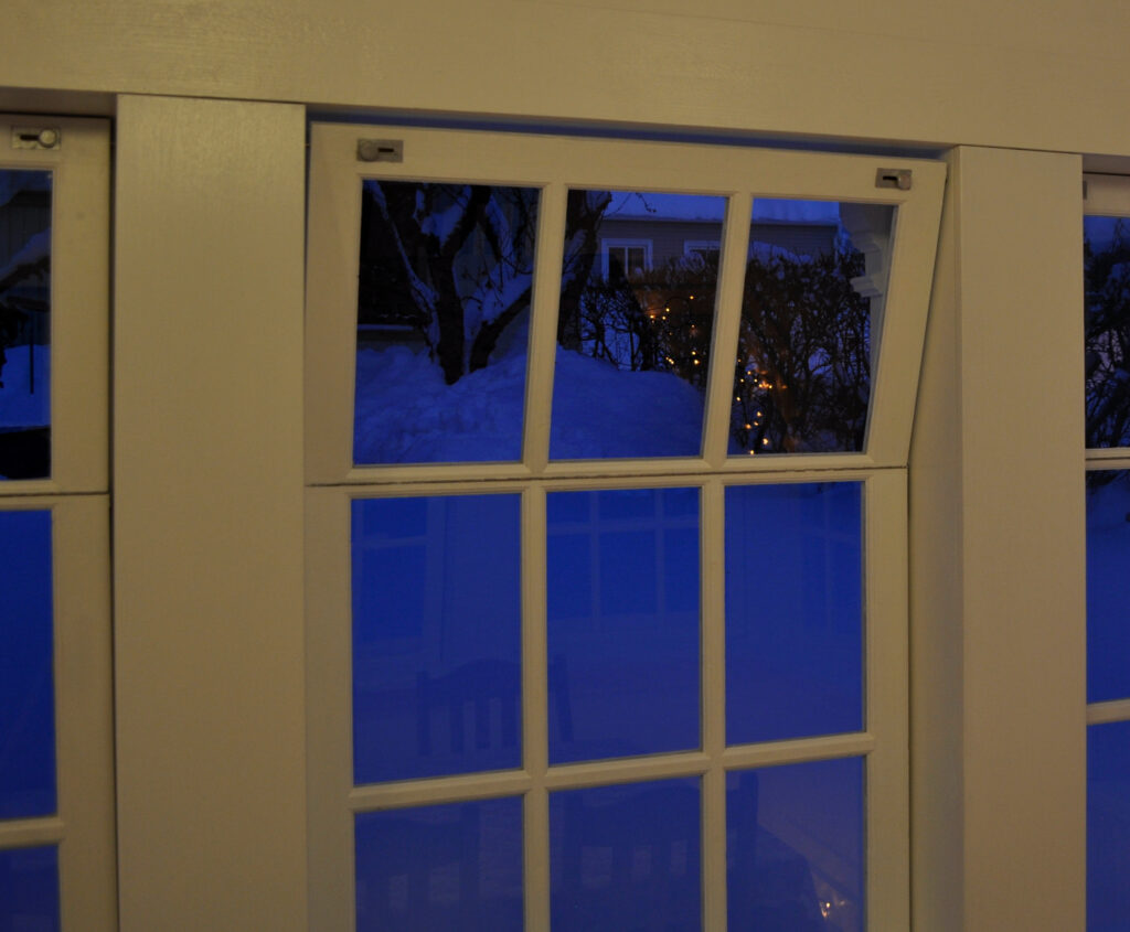 Garden temple window, half open, ventilation position.